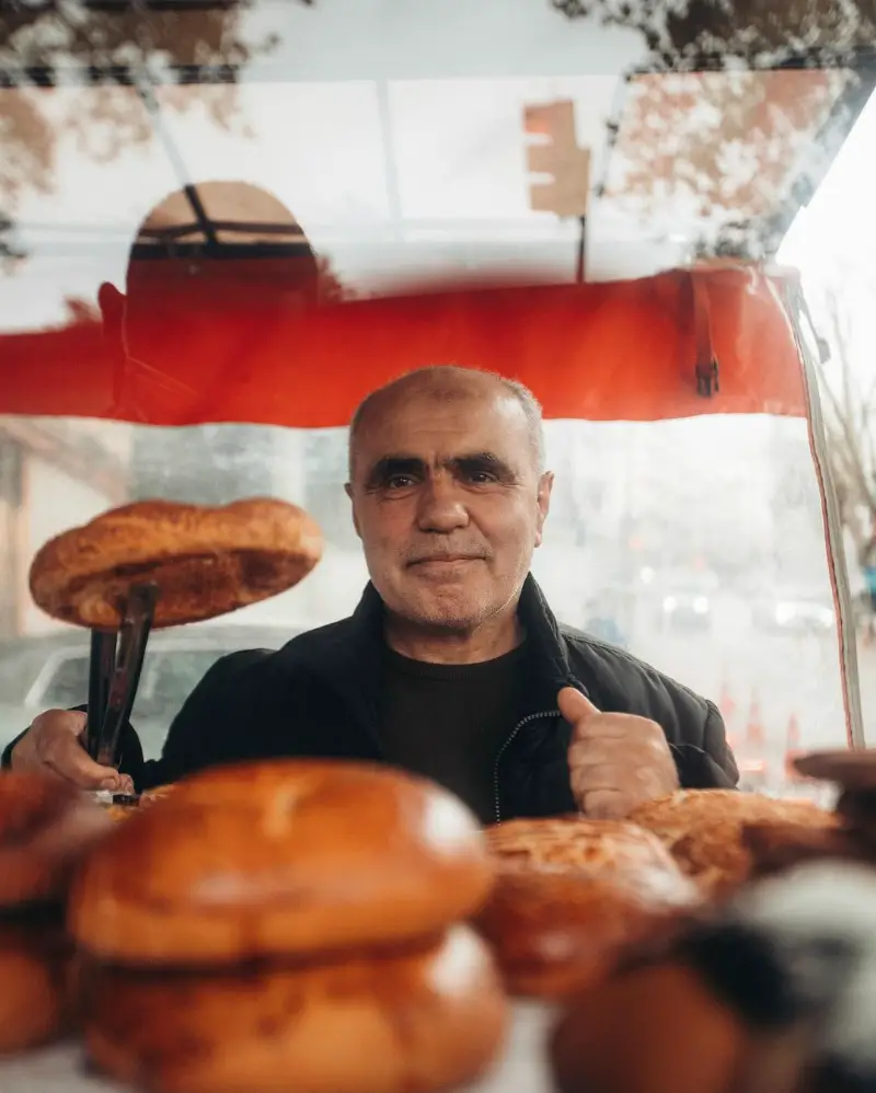 Local Man Selling Bread