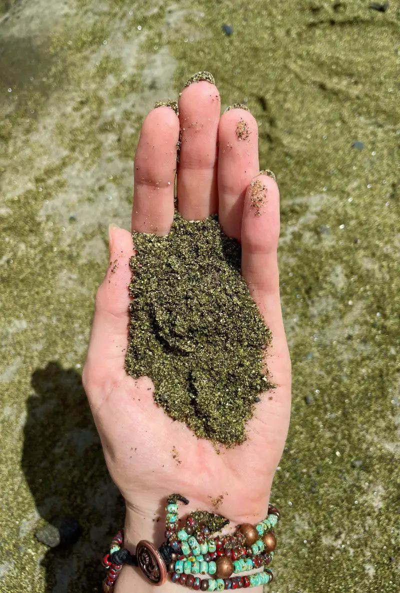 Handful of Olivine Sand